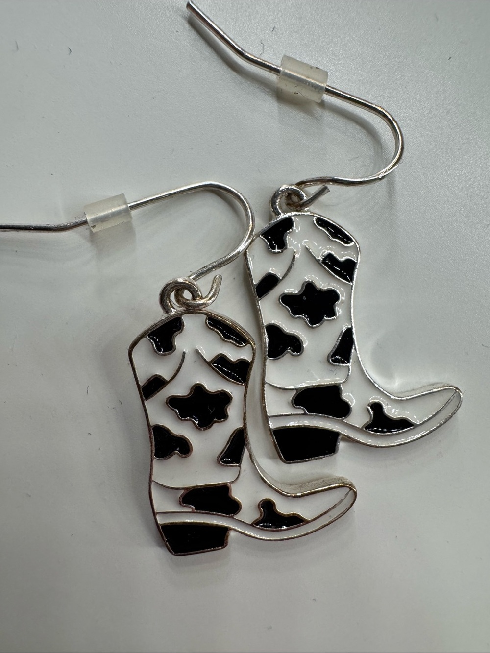 Claire's Black and White Cow Print Cowboy Boot Earrings